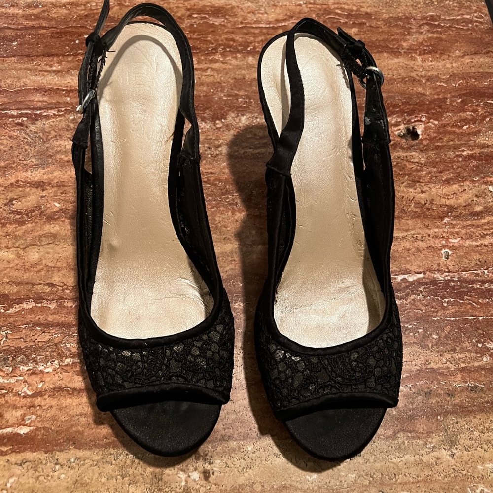 Nine West Woman’s black lace high heals